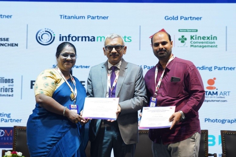 Ms. Radhika, Senior Operations Manager, and Mr. Naresh, Events Manager receiving their certificates from Sooraj Dhawan, President, Indian Exhibition Industry Association (IEIA) Founder & Director